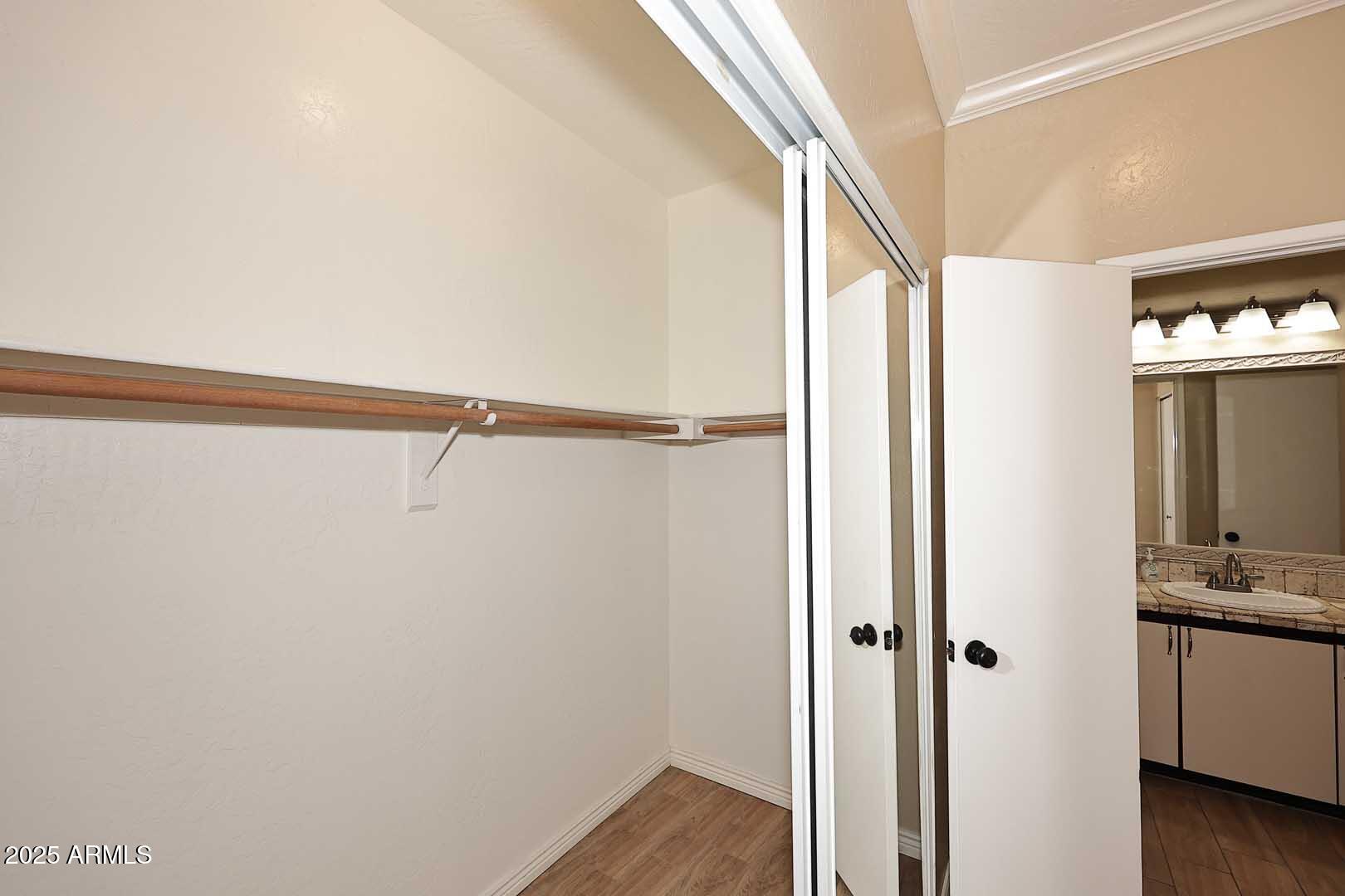 1126 West Elliot Road, Unit 1040 Chandler, AZ 85224 - Photo 17 of 25 a bathroom with a shower and a view of bathroom