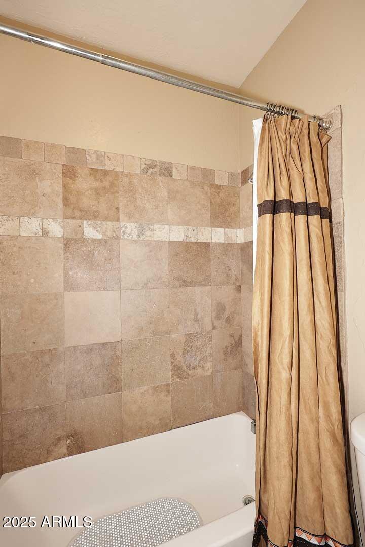 1126 West Elliot Road, Unit 1040 Chandler, AZ 85224 - Photo 21 of 25 a bathroom with a shower