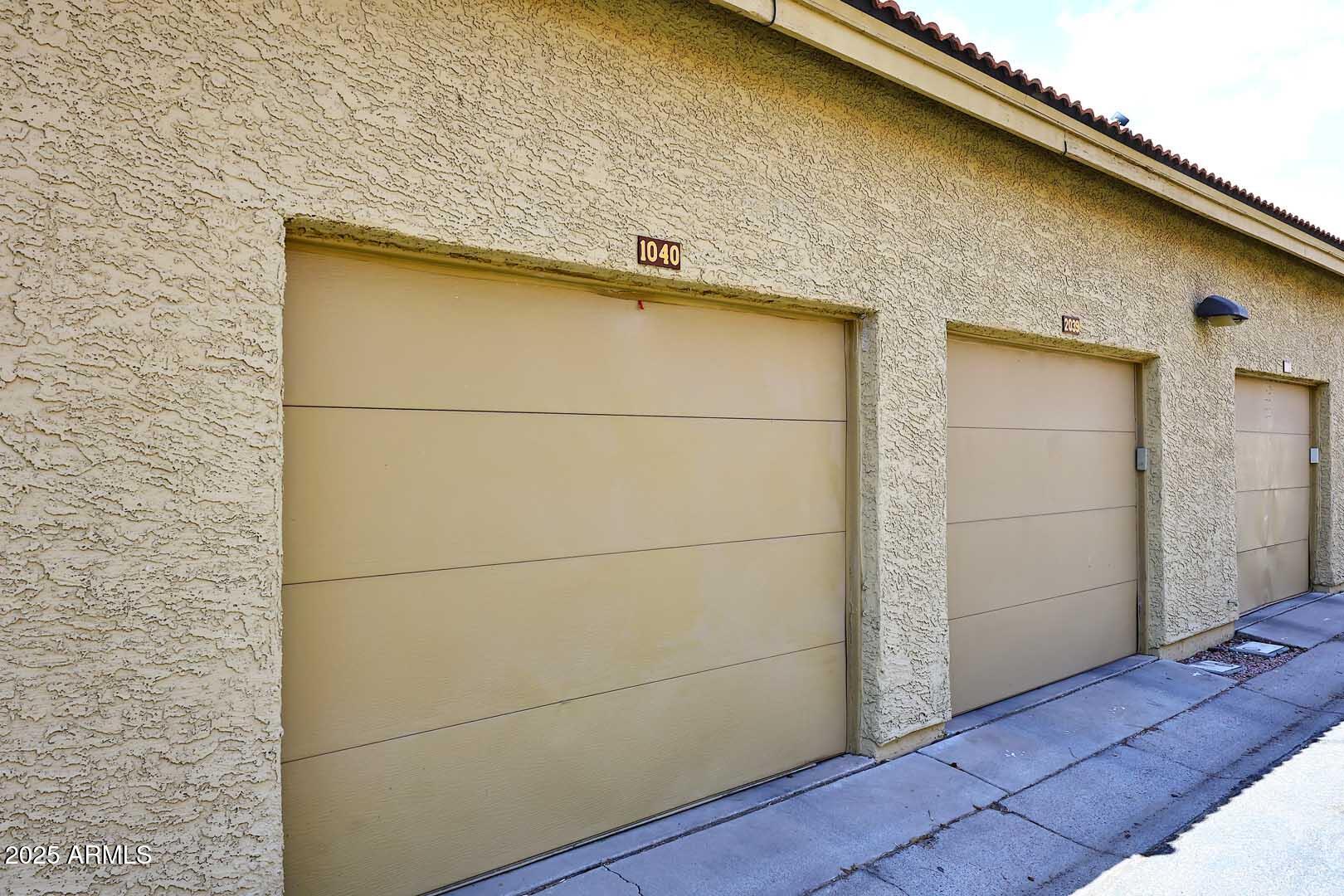 1126 West Elliot Road, Unit 1040 Chandler, AZ 85224 - Photo 25 of 25 a view of a garage