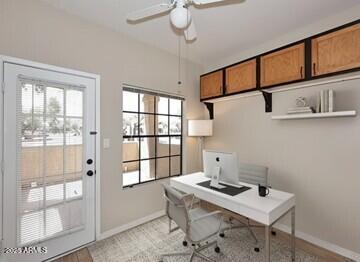 1126 West Elliot Road, Unit 1040 Chandler, AZ 85224 - Photo 5 of 25 a view of a workspace with furniture and a window