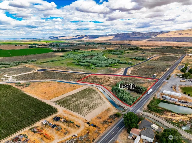a view of a swimming pool with a lounge chairs
