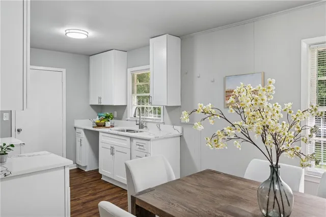 a kitchen with a stove and a refrigerator