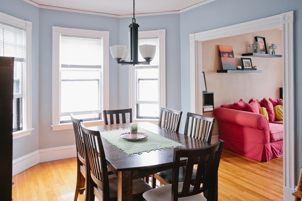 9-11 Campbell Park Somerville, MA 02144 - Photo 11 of 19 a view of a dining room with furniture and wooden floor