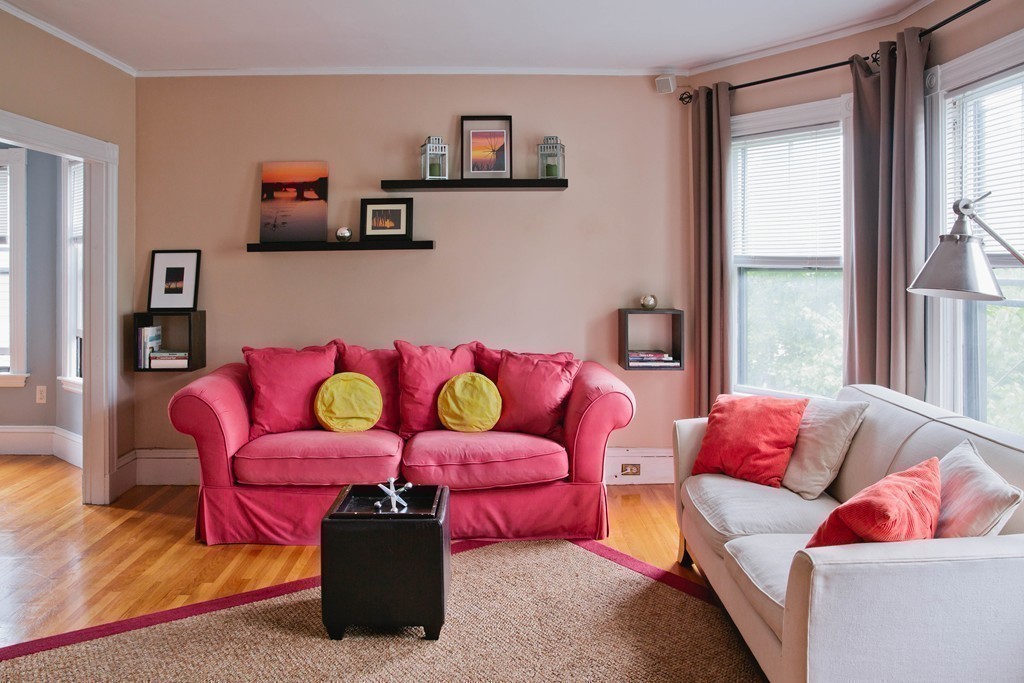 9-11 Campbell Park Somerville, MA 02144 - Photo 12 of 19 a living room with furniture and a window