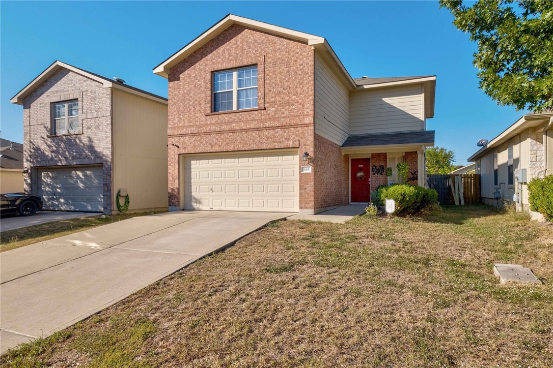 169 Black Forest Road Buda, TX 78610 - Photo 1 of 1 a front view of a house with a yard