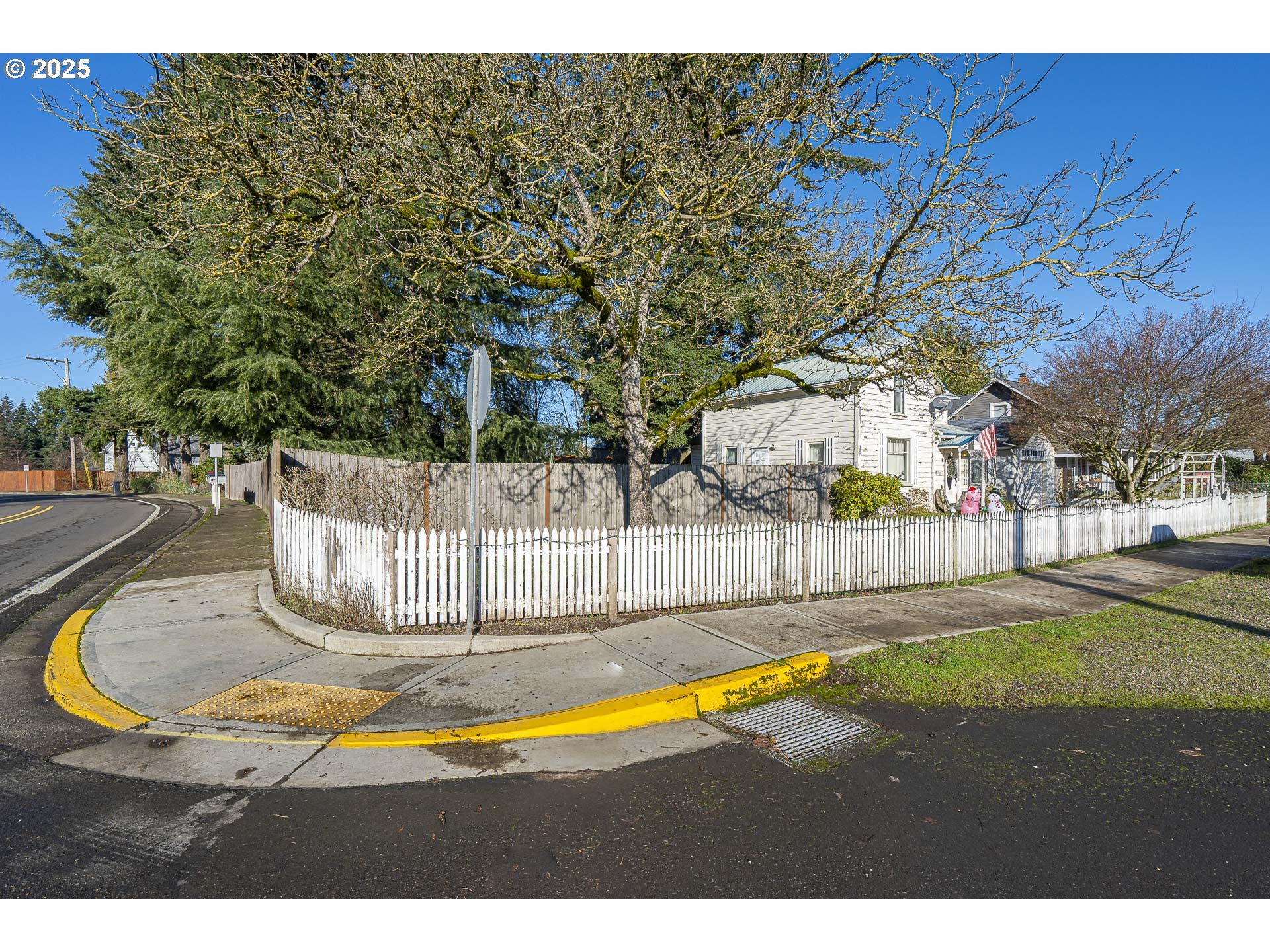 3035 5th Street Hubbard, OR 97032 - Photo 2 of 5 a backyard of a house with table and chairs