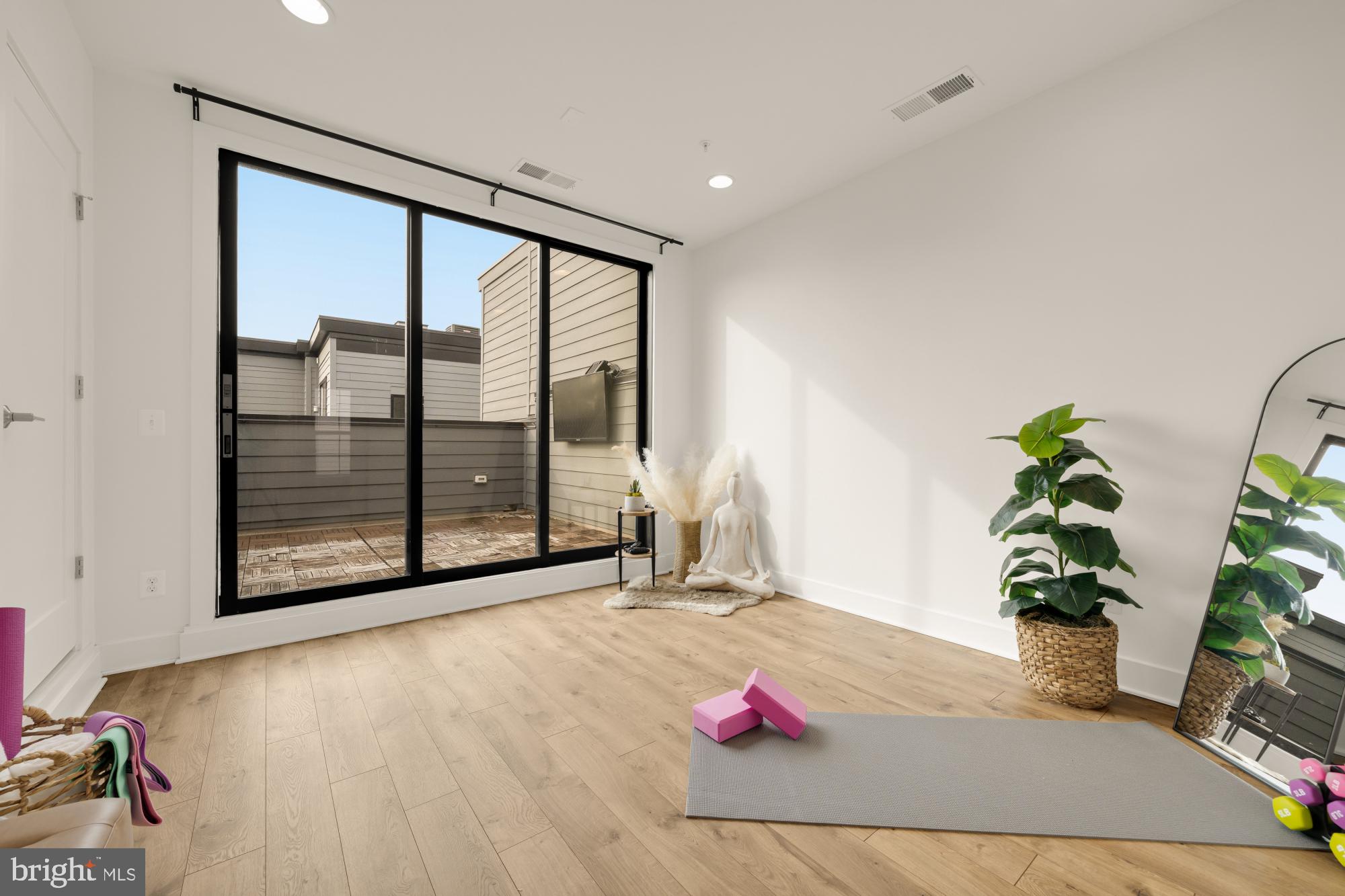 11246 Faraday Park Drive Reston, VA 20190 - Photo 32 of 48 Triple Sliding Doors to Terrace