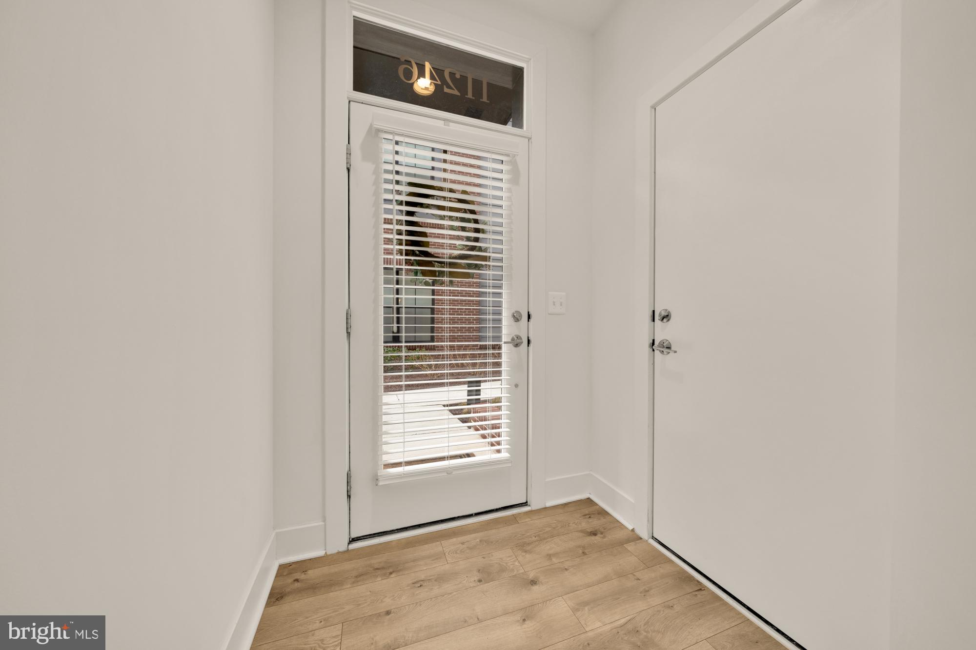 11246 Faraday Park Drive Reston, VA 20190 - Photo 40 of 48 Front Door & Door to Garage