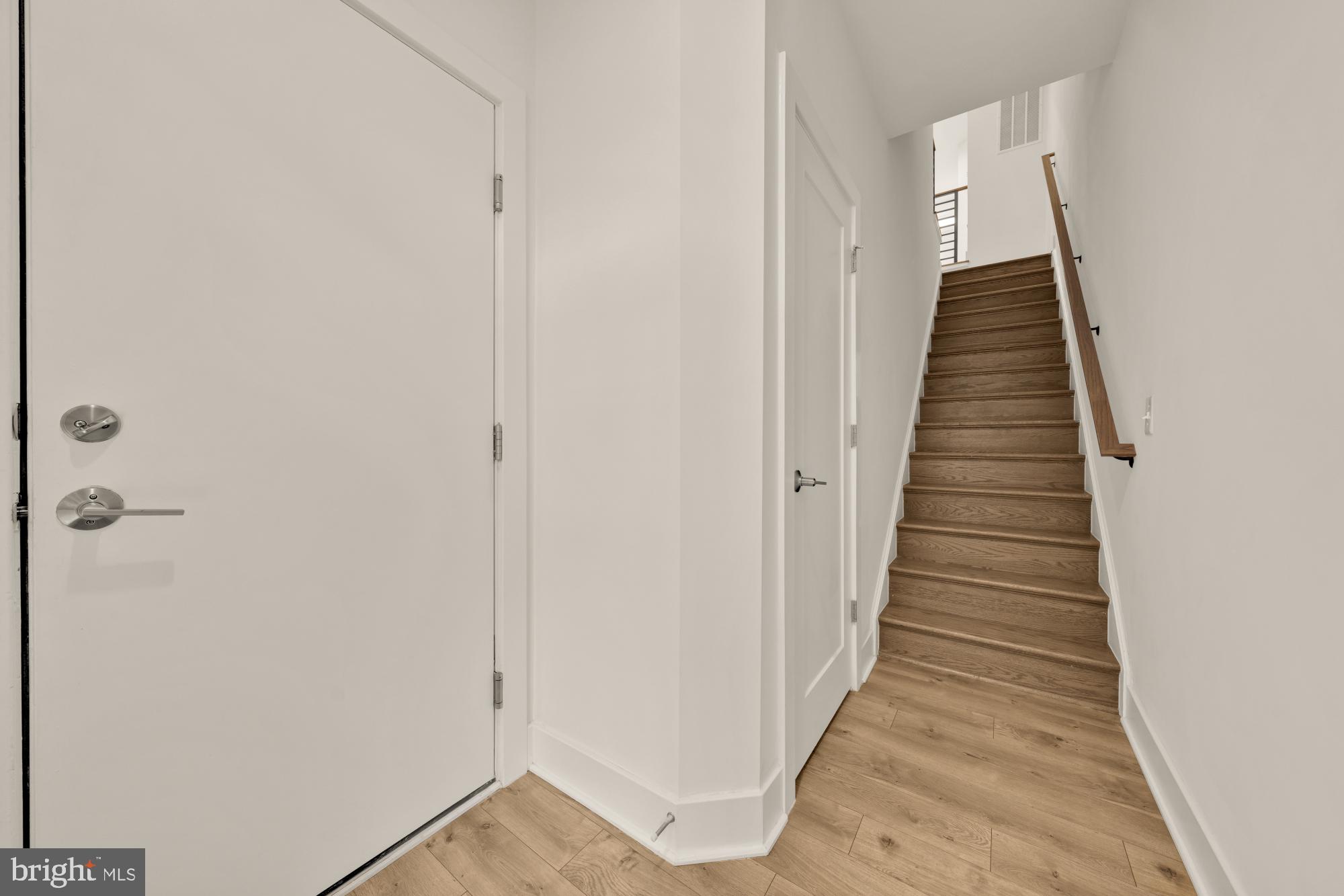 11246 Faraday Park Drive Reston, VA 20190 - Photo 41 of 48 Door to Garage from Front Door