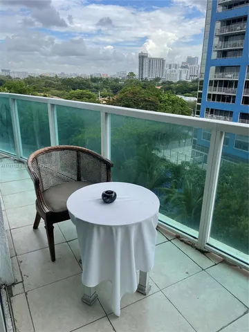 a view of a chairs and table in the terrace