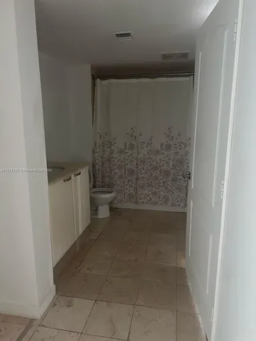 a bathroom with a toilet