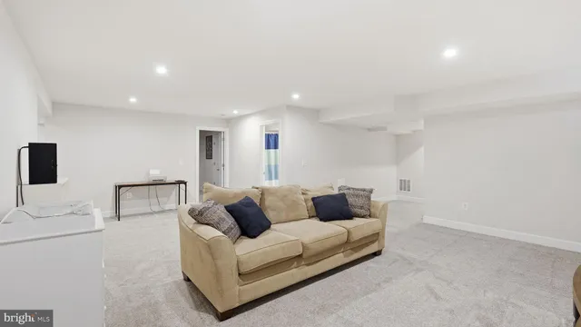 a bathroom with a toilet a sink and a bath tub