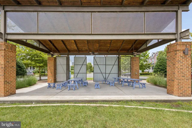 a view of a building with sitting area