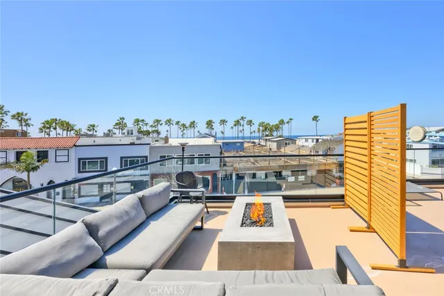 a view of roof deck with patio