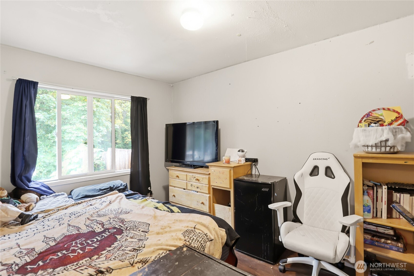 2861 Clare Avenue Bremerton, WA 98310 - Photo 15 of 39 a bedroom with a bed and a television