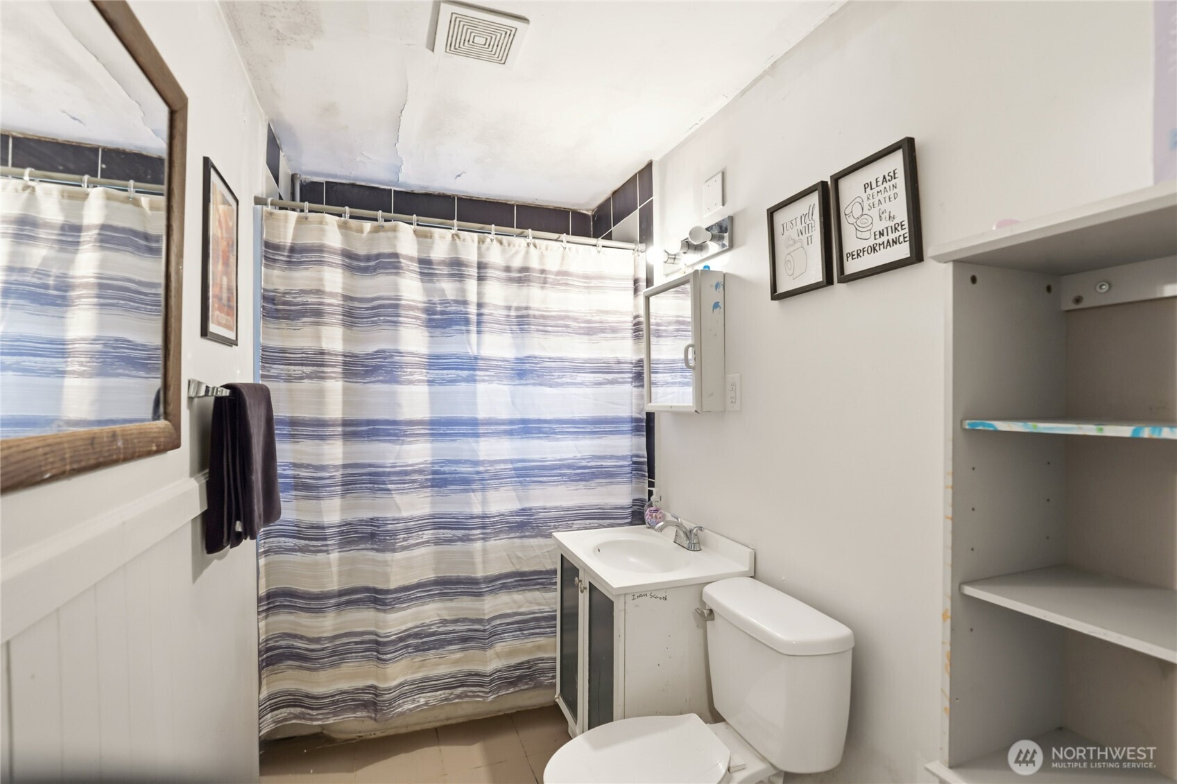 2861 Clare Avenue Bremerton, WA 98310 - Photo 16 of 39 a bathroom with a sink toilet and shower