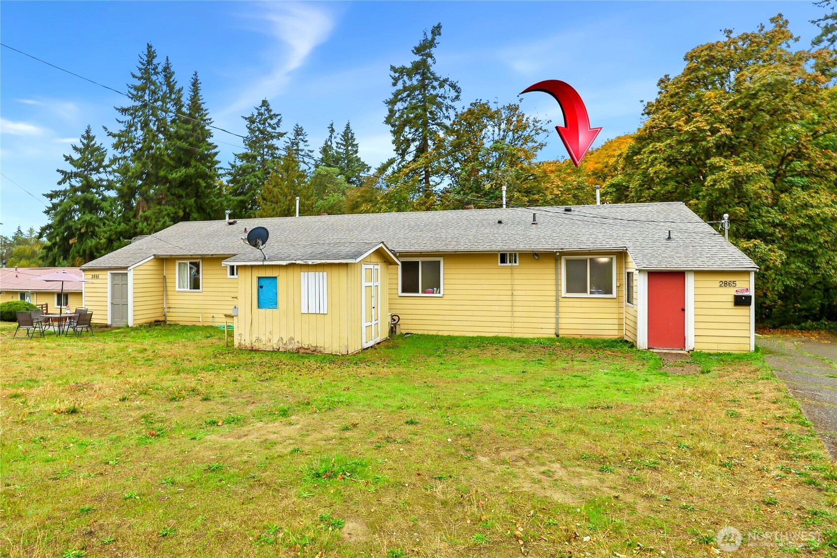 2861 Clare Avenue Bremerton, WA 98310 - Photo 21 of 39 a view of a house with pool and a yard