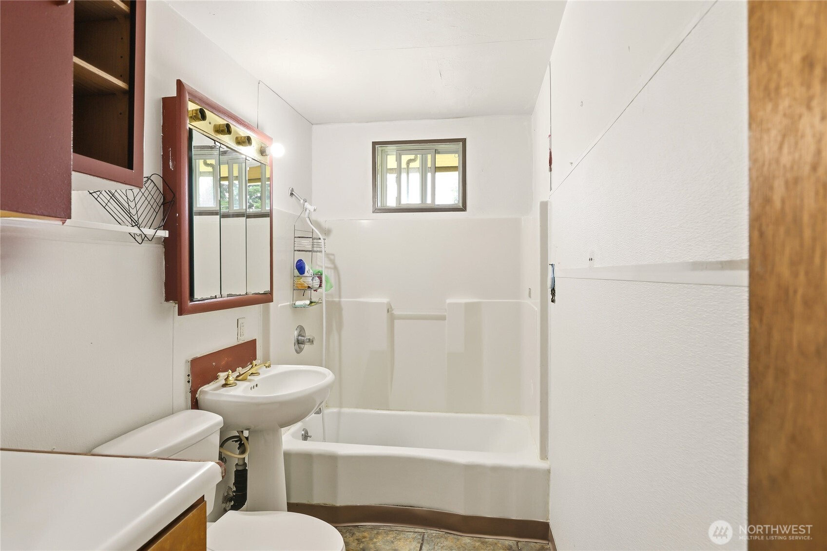 2861 Clare Avenue Bremerton, WA 98310 - Photo 31 of 39 a bathroom with a sink toilet and shower