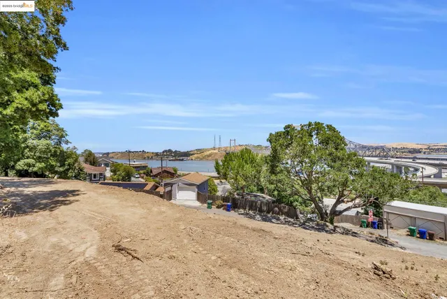 a view of a road with a building in the background