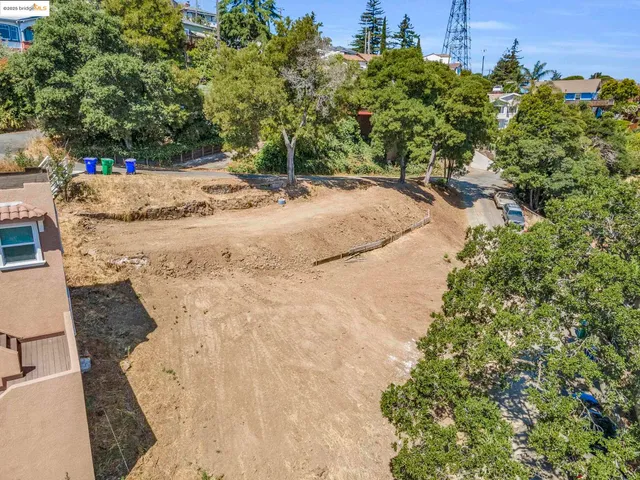 a view of a backyard of a house