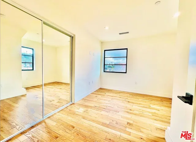 a view of an empty room and window