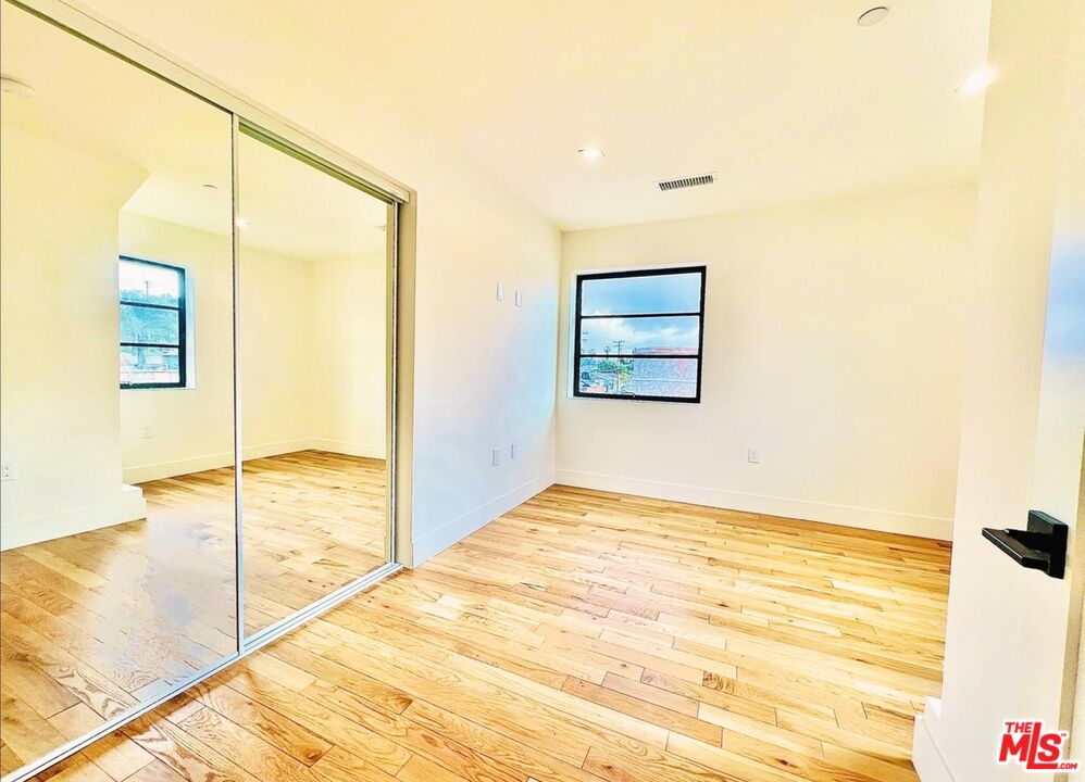 4152 1/2 Rogers Street, Unit 1/2 Los Angeles, CA 90063 - Photo 12 of 21 a view of an empty room and window