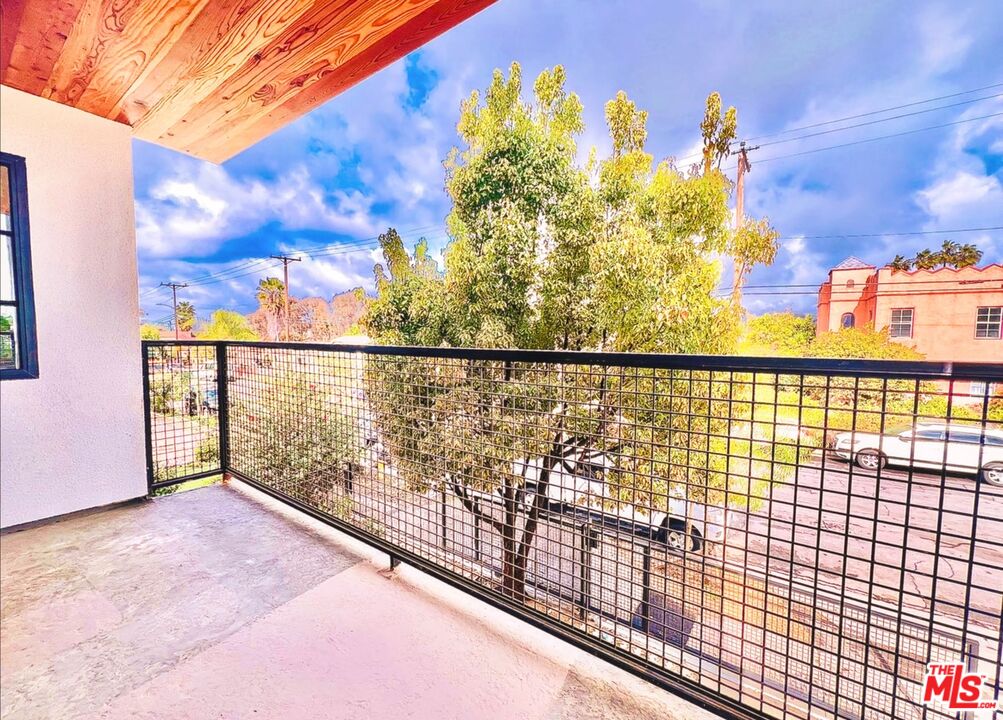 4152 1/2 Rogers Street, Unit 1/2 Los Angeles, CA 90063 - Photo 3 of 21 a view of city from a balcony