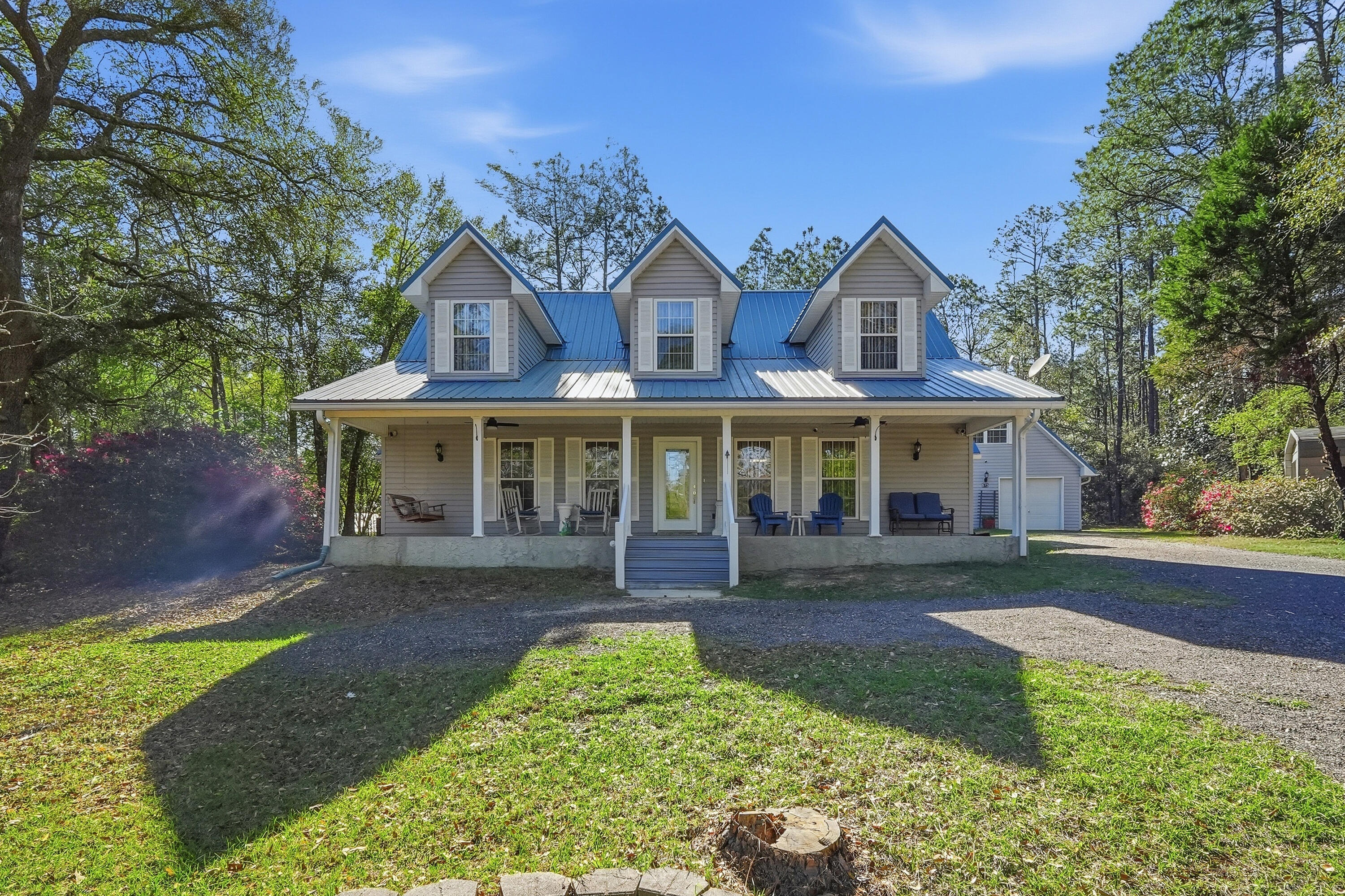 675 Spring Lake Road DeFuniak Springs, FL 32433 - Photo 1 of 91 front view of a house with a yard