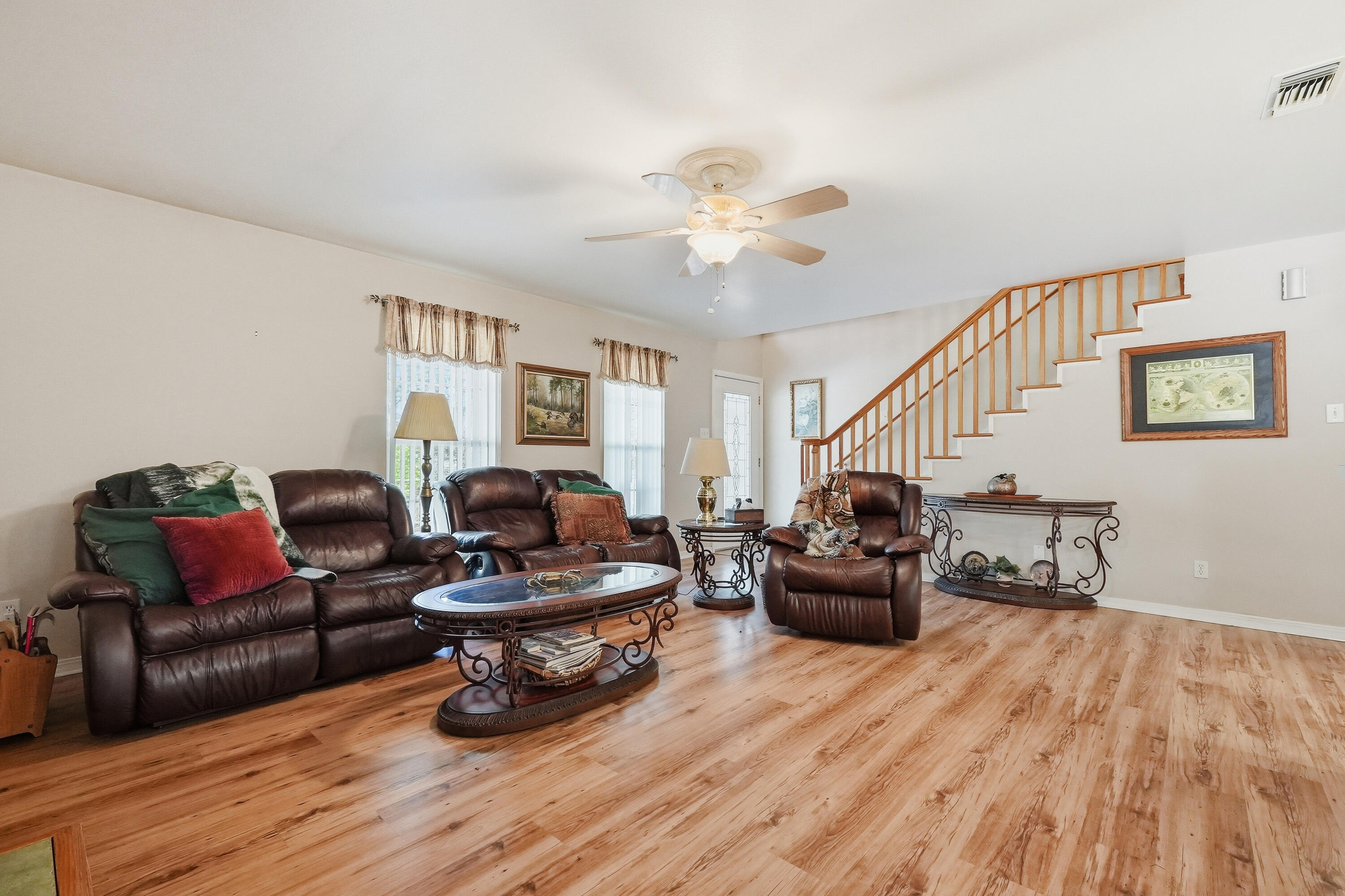 675 Spring Lake Road DeFuniak Springs, FL 32433 - Photo 13 of 91 a living room with furniture and wooden floor