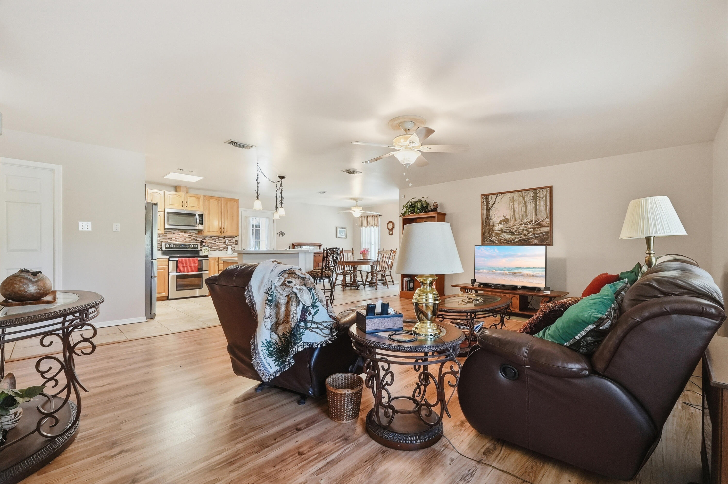 675 Spring Lake Road DeFuniak Springs, FL 32433 - Photo 15 of 91 a living room with furniture and wooden floor