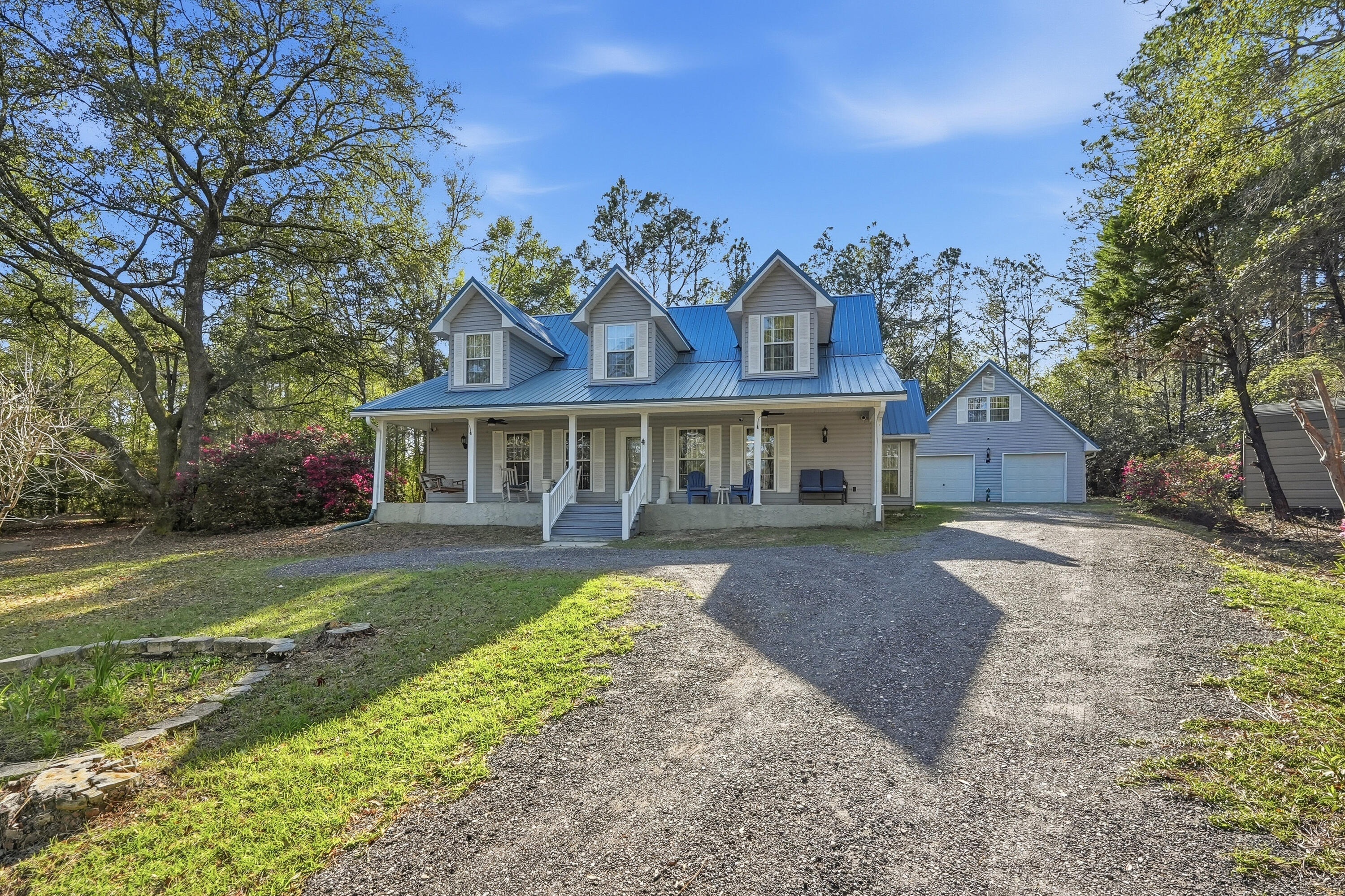 675 Spring Lake Road DeFuniak Springs, FL 32433 - Photo 2 of 91 a front view of house with yard and green space