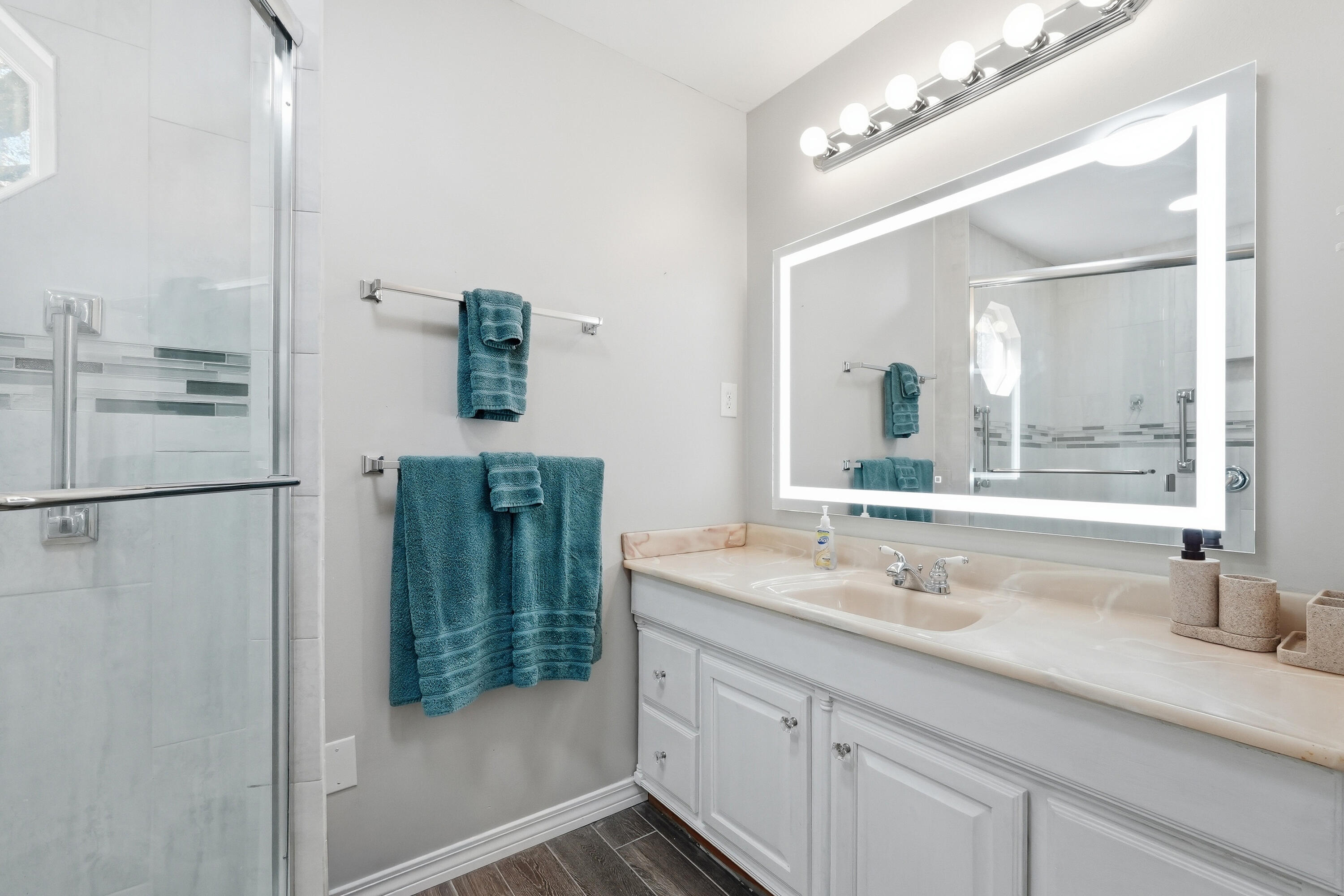 675 Spring Lake Road DeFuniak Springs, FL 32433 - Photo 31 of 91 a bathroom with a sink double vanity and a mirror