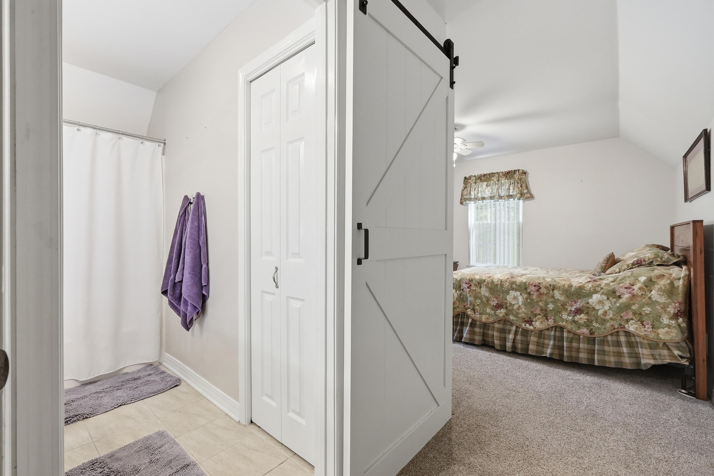 675 Spring Lake Road DeFuniak Springs, FL 32433 - Photo 47 of 91 a view of bedroom with furniture and wooden floor