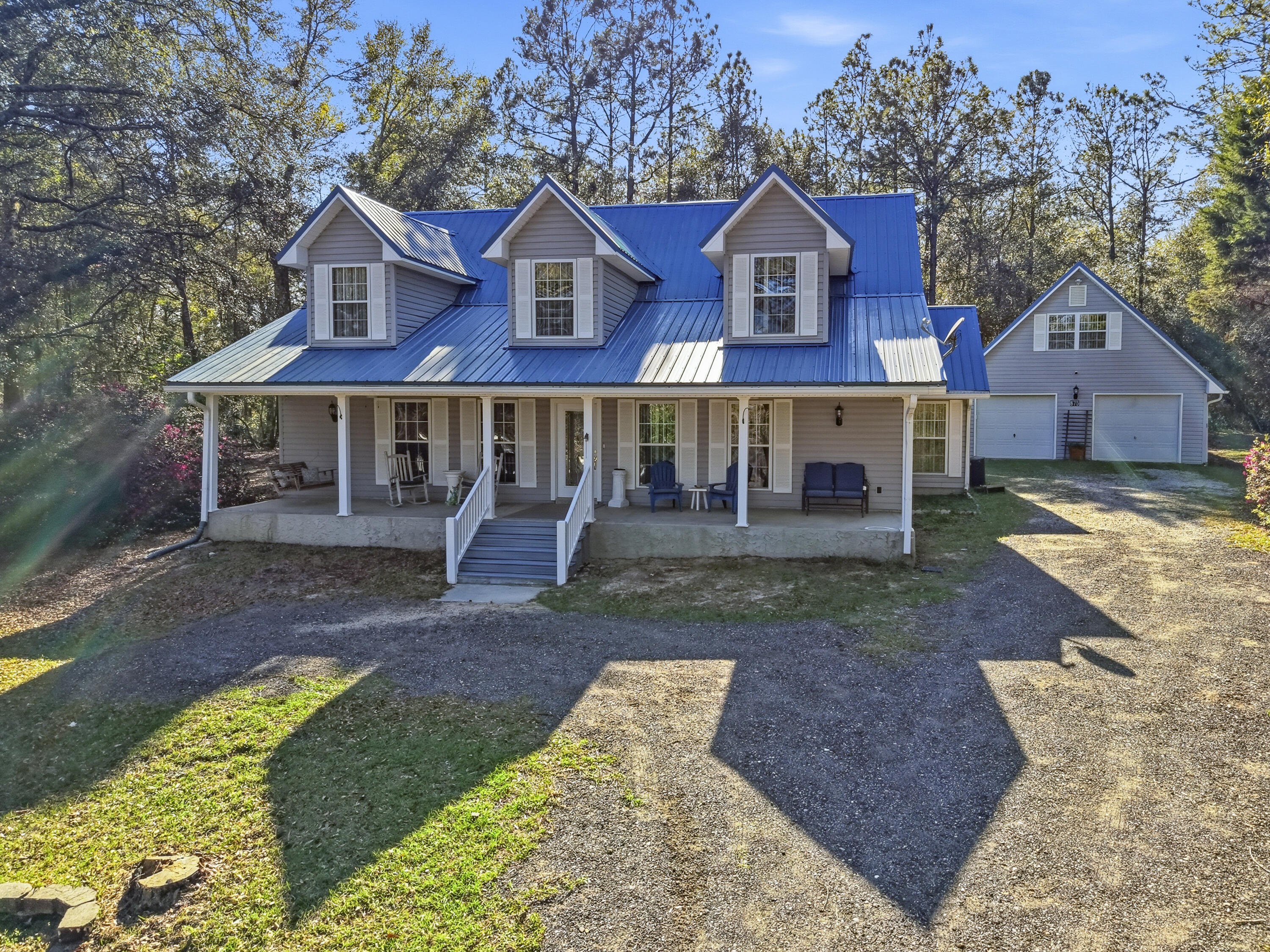 675 Spring Lake Road DeFuniak Springs, FL 32433 - Photo 6 of 91 front view of a house with a yard