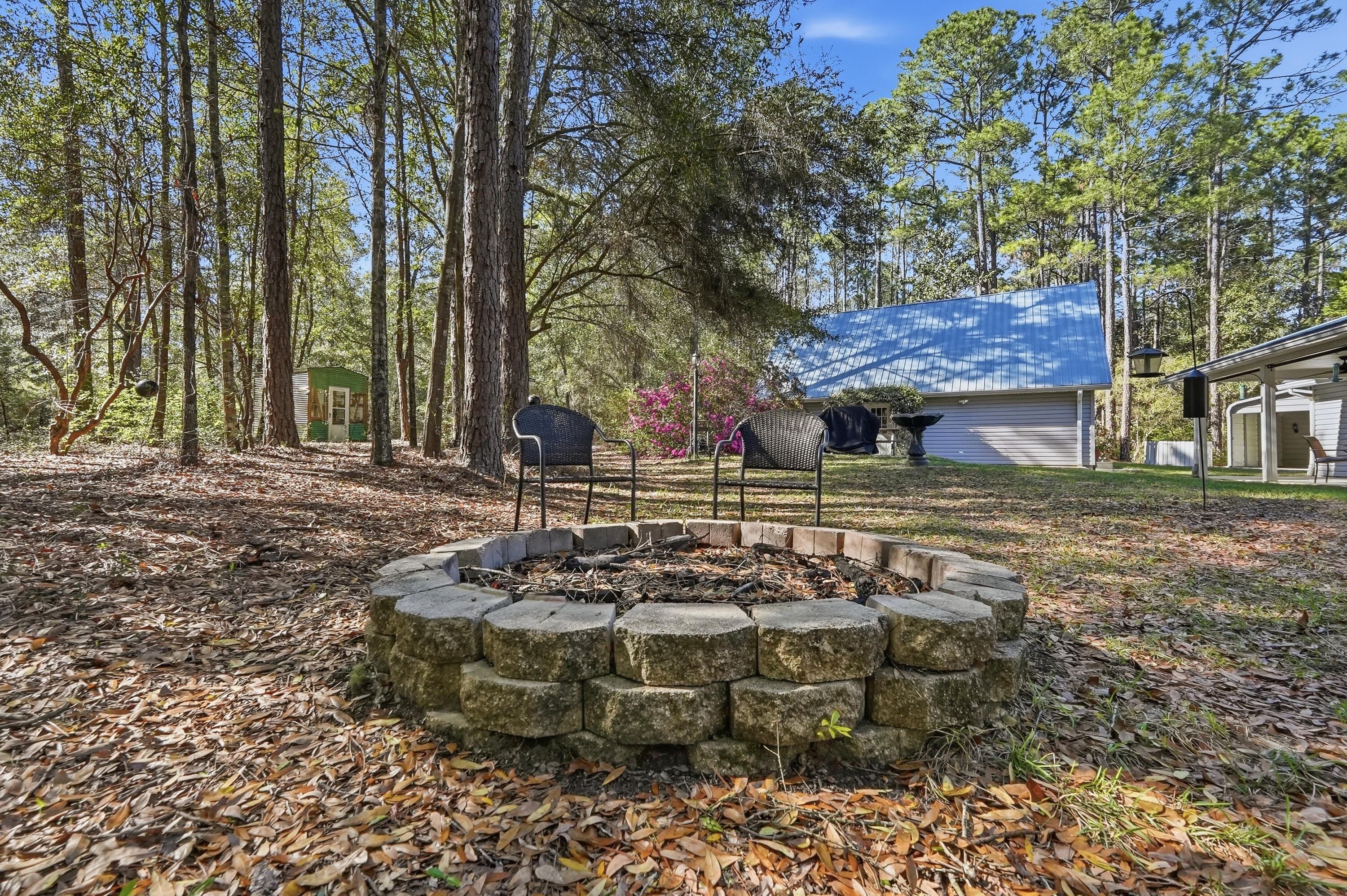 675 Spring Lake Road DeFuniak Springs, FL 32433 - Photo 68 of 91 a view of a yard with an outdoor space