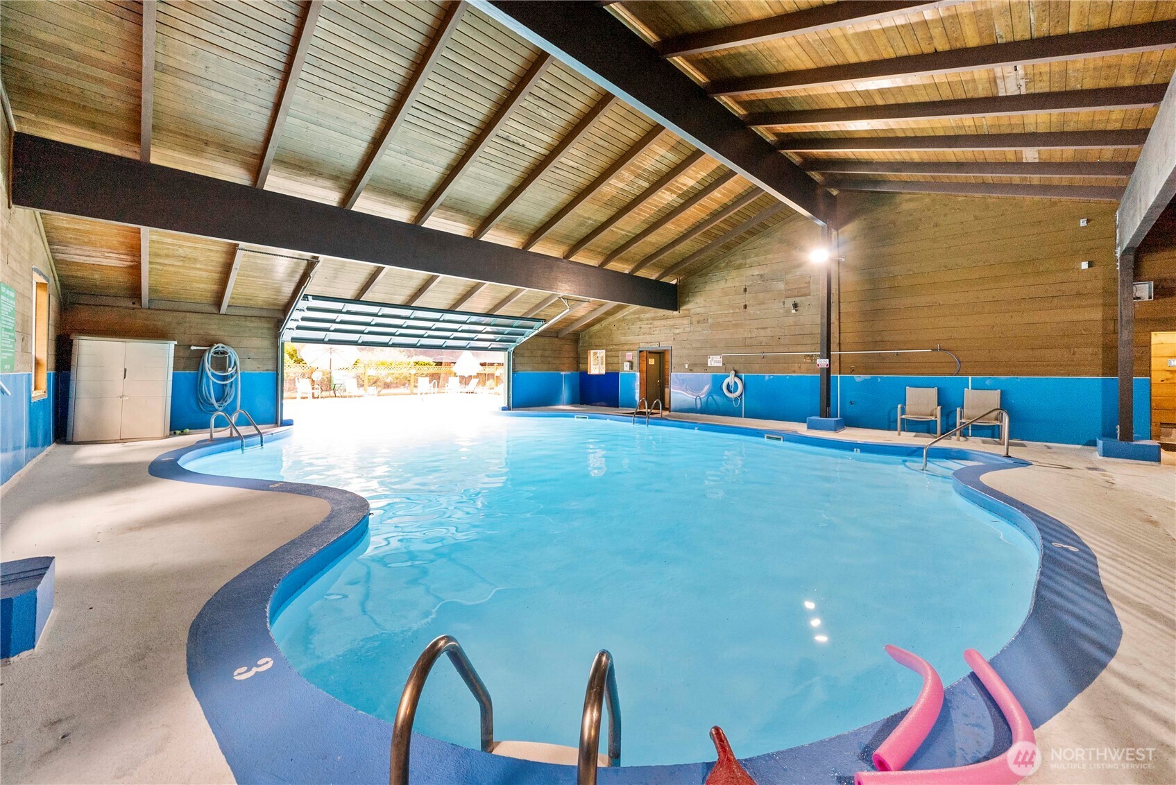 1546 Reservation Road Southeast, Unit 149 Olympia, WA 98513 - Photo 24 of 38 a view of swimming pool with a couch