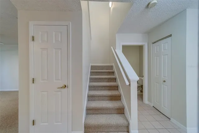 a bathroom with a double vanity sink and mirror