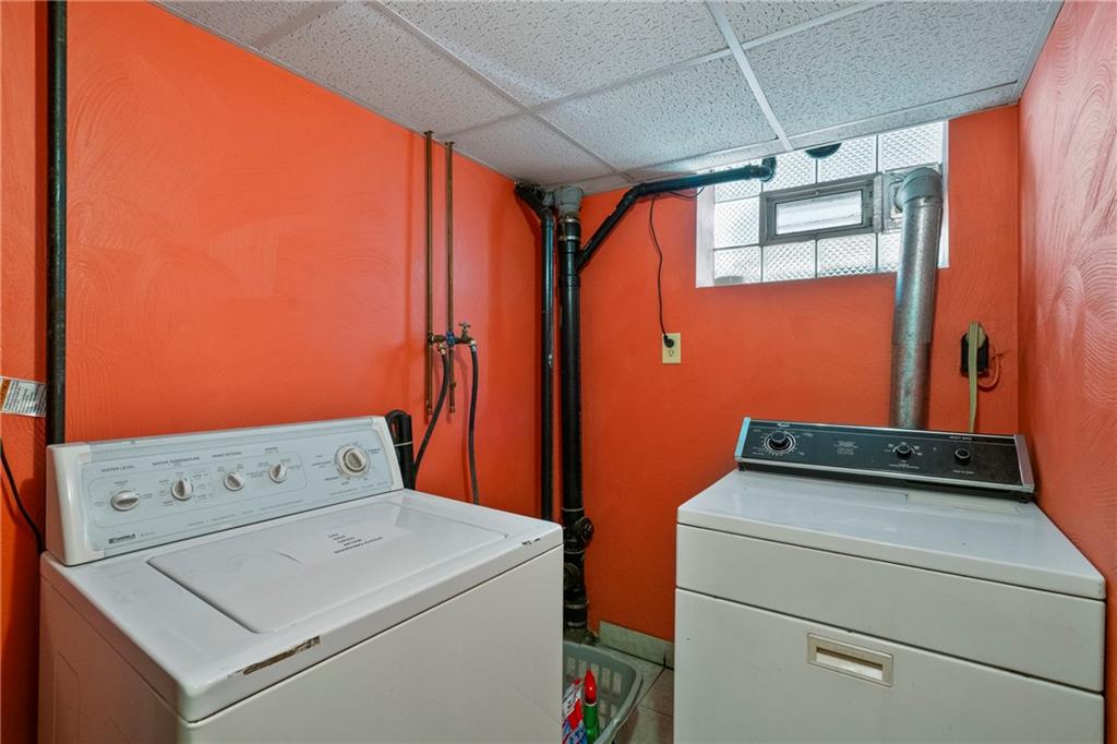229 Dewey Street Pittsburgh, PA 15218 - Photo 26 of 33 a utility room with dryer and washer