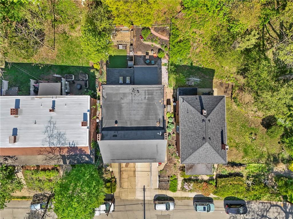 229 Dewey Street Pittsburgh, PA 15218 - Photo 27 of 33 an aerial view of a house with a yard