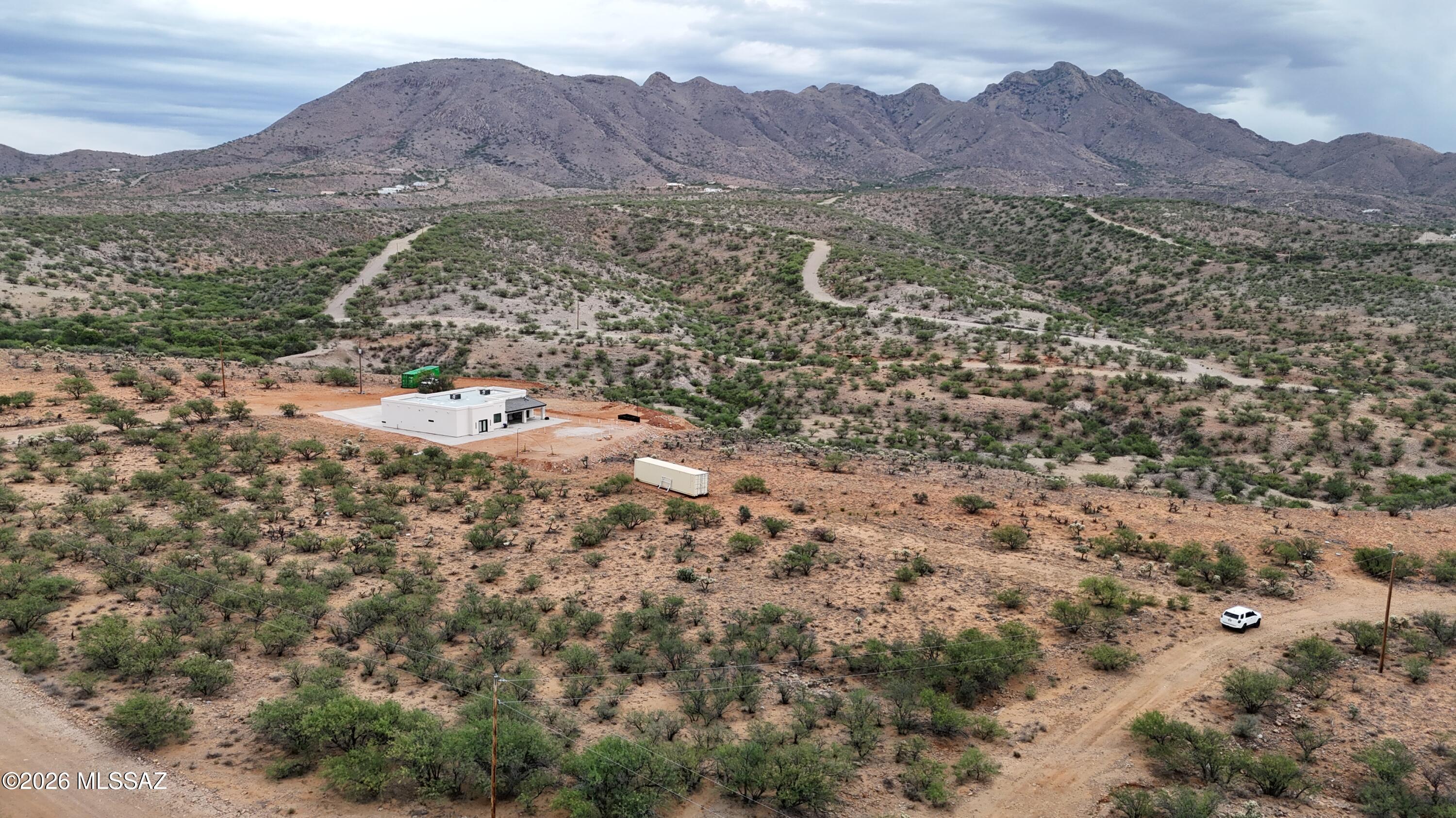 203 Loza Court, Unit 71 Rio Rico, AZ 85648 - Photo 10 of 11 a view of a house with a mountain