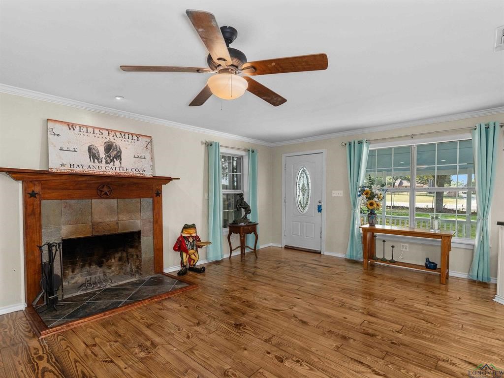 6006 Highway 315 Carthage, TX 75633 - Photo 11 of 35 a living room with furniture and a fireplace