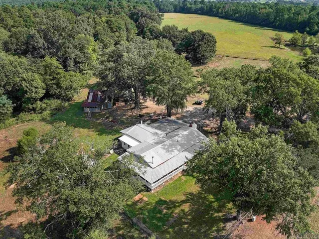 a view of a yard with an outdoor space