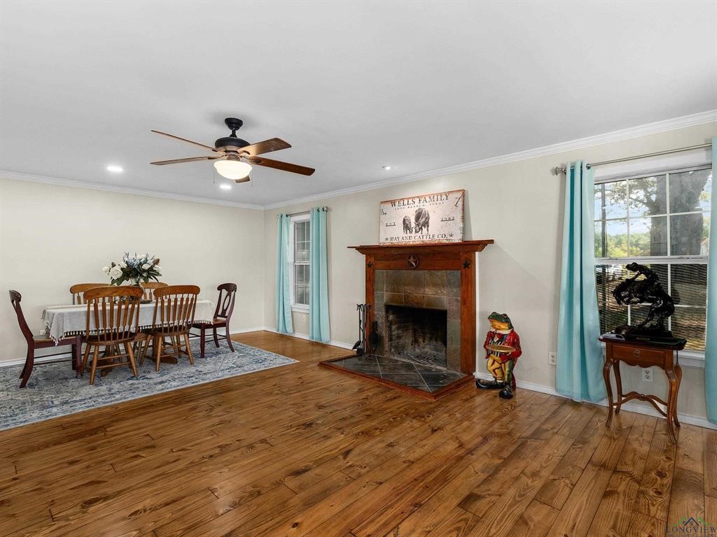 6006 Highway 315 Carthage, TX 75633 - Photo 4 of 35 a living room with furniture and a fireplace