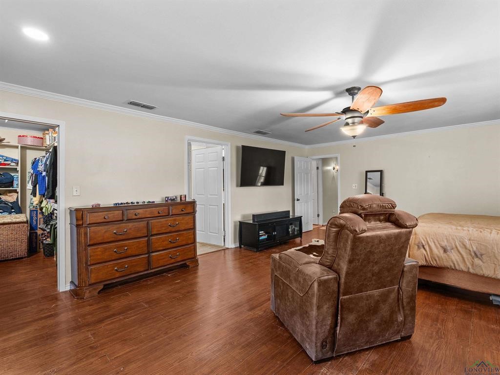 6006 Highway 315 Carthage, TX 75633 - Photo 10 of 35 a living room with furniture and a fireplace