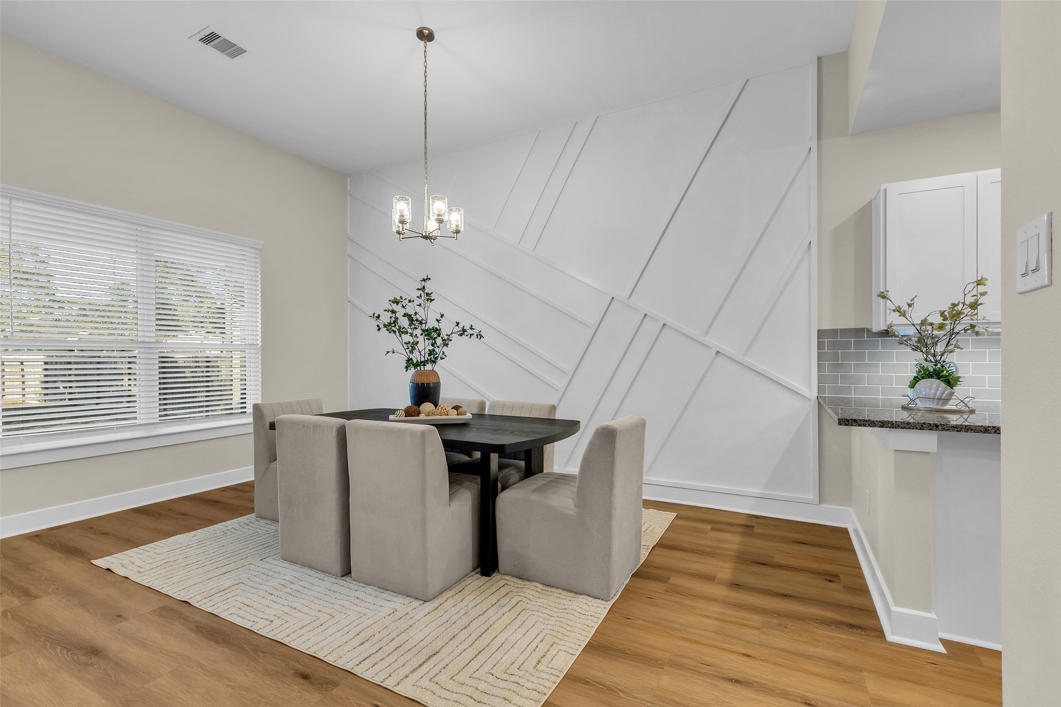 12341 North Chestnut Hills Road Conroe, TX 77303 - Photo 13 of 43 Versatility. Breakfast bar for a quick bite or a dining room for a sit-down meal.