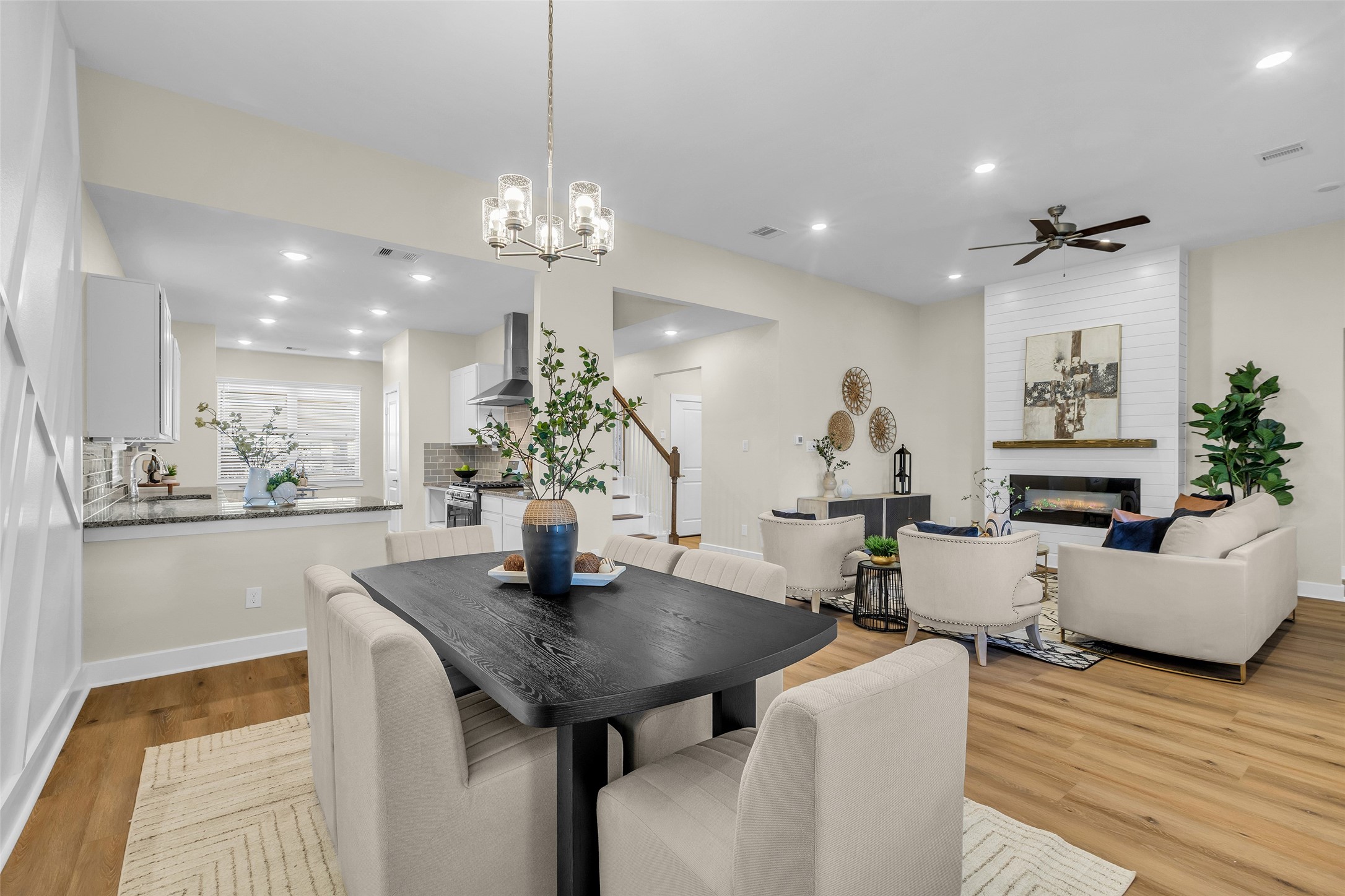 12341 North Chestnut Hills Road Conroe, TX 77303 - Photo 15 of 43 “This open living and dining space creates a welcoming atmosphere, ideal for family gatherings or hosting friends.