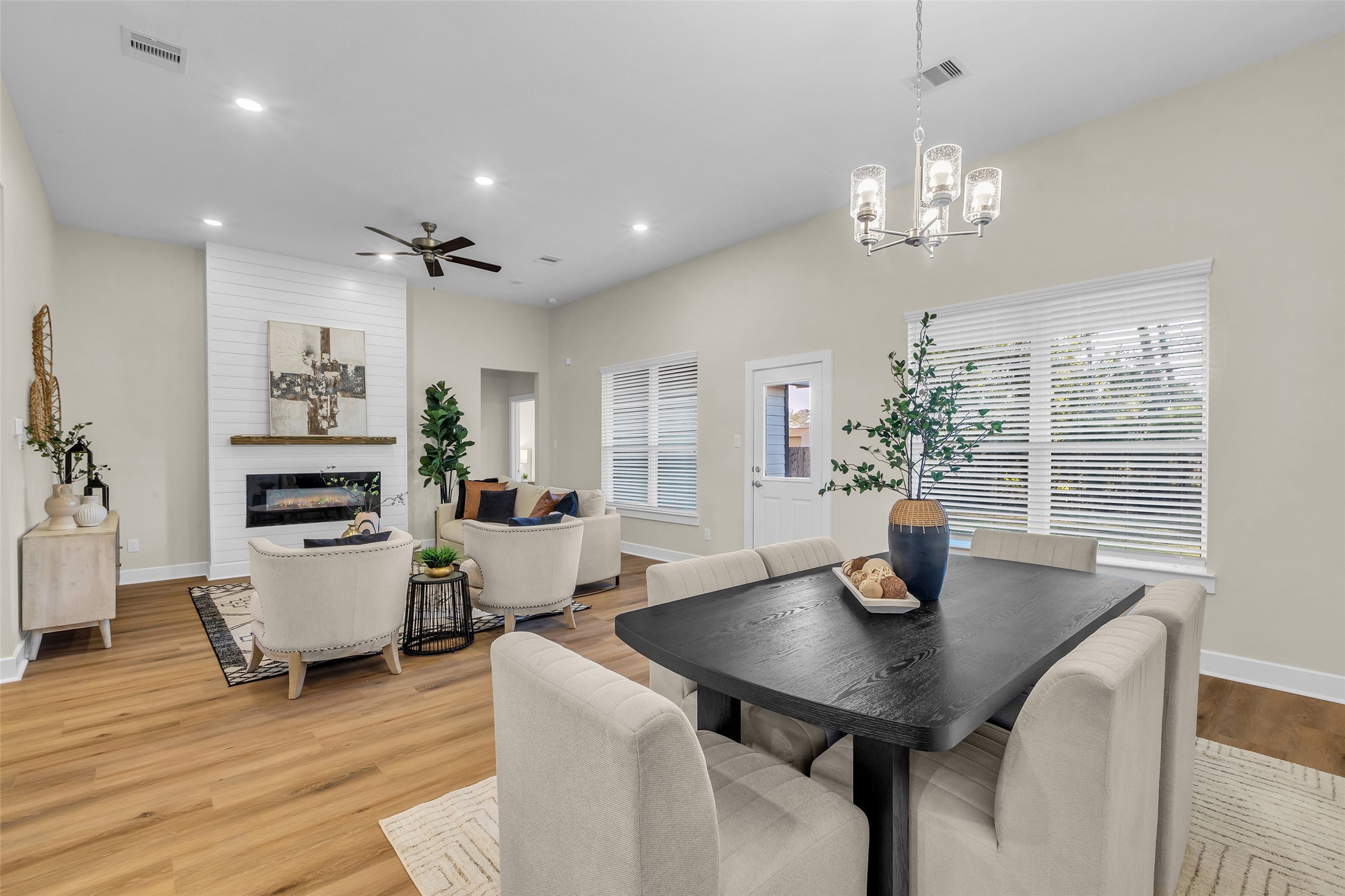 12341 North Chestnut Hills Road Conroe, TX 77303 - Photo 16 of 43 The open living and dining area is enhanced by soaring high ceilings, creating a bright and airy atmosphere