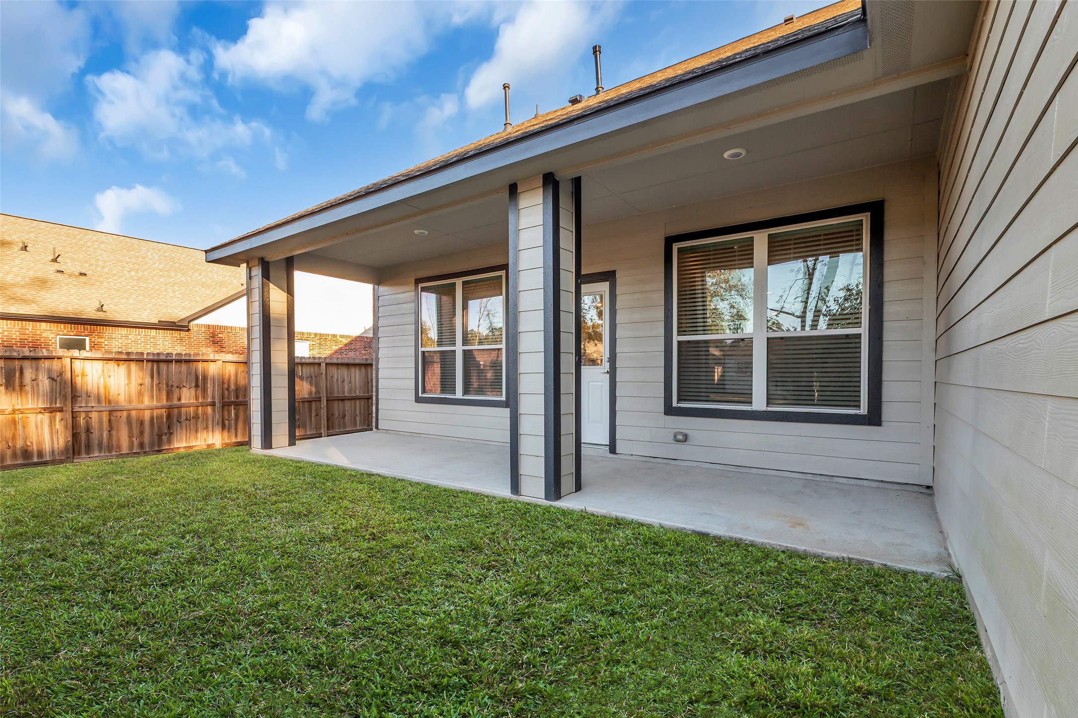 12341 North Chestnut Hills Road Conroe, TX 77303 - Photo 31 of 43 Enjoy the outdoors from the large covered patio, ideal for dining, lounging, or hosting friends and family.