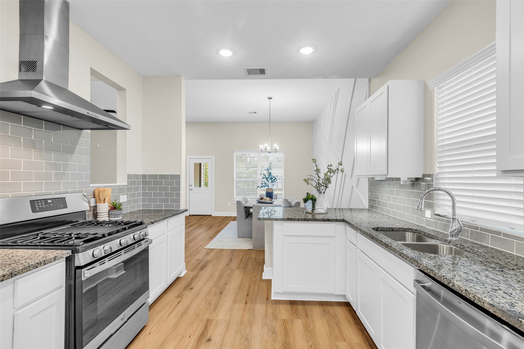 12341 North Chestnut Hills Road Conroe, TX 77303 - Photo 9 of 43 From your flex space to the kitchen and it opens right up to the dining room.