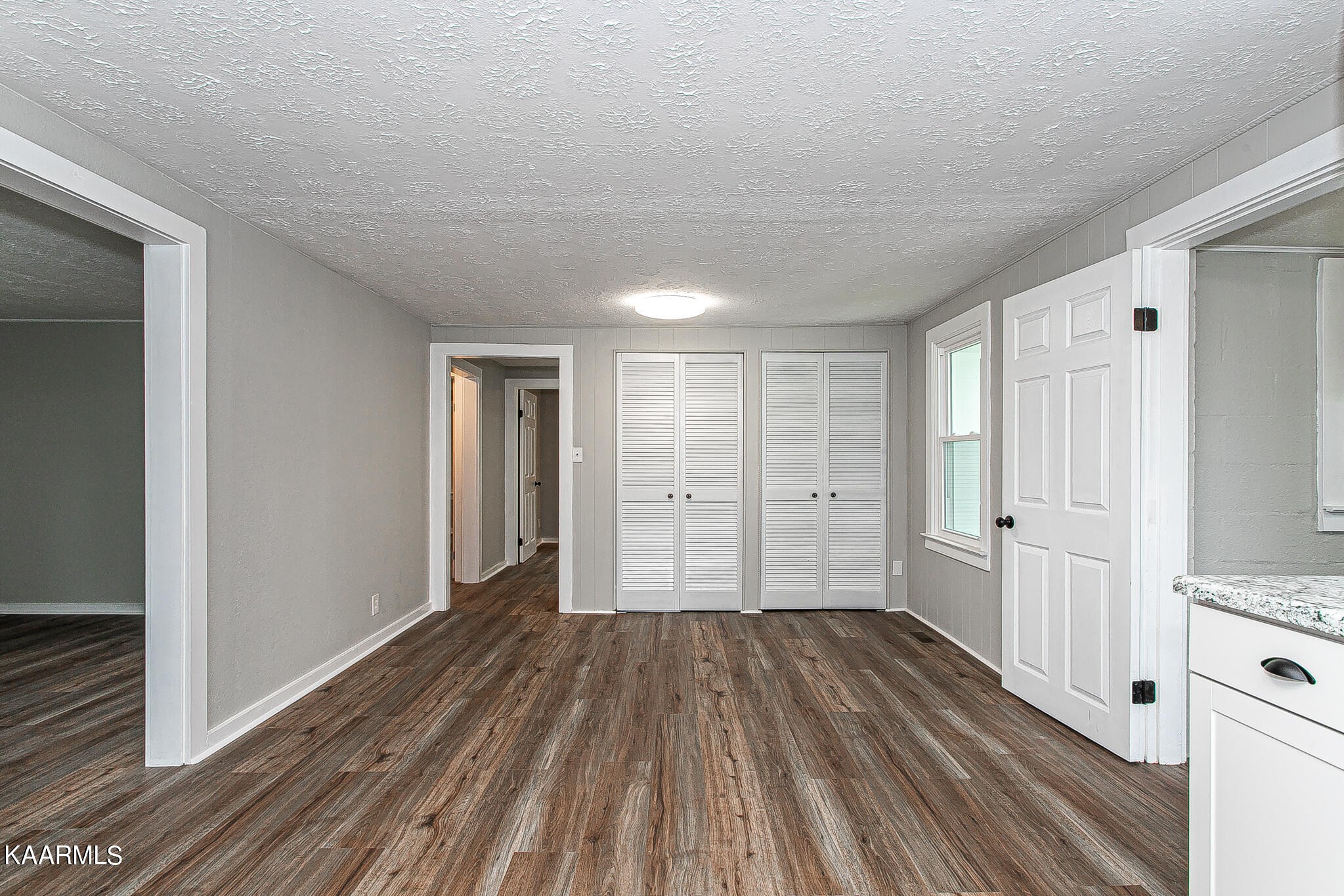 207 Bethel Road Clinton, TN 37716 - Photo 8 of 36 a view of a livingroom with wooden floor